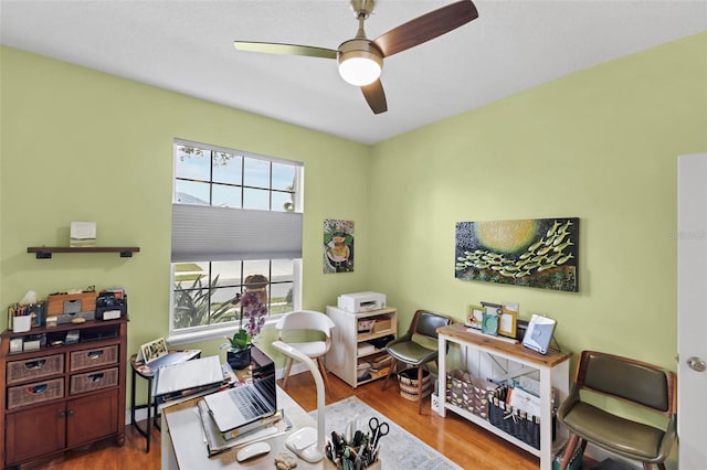 office space with ceiling fan and wood-type flooring