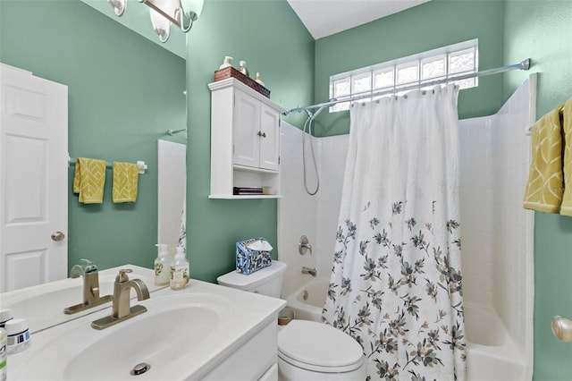 full bathroom with vanity, toilet, and shower / bath combo with shower curtain