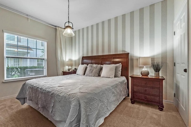 bedroom with light colored carpet