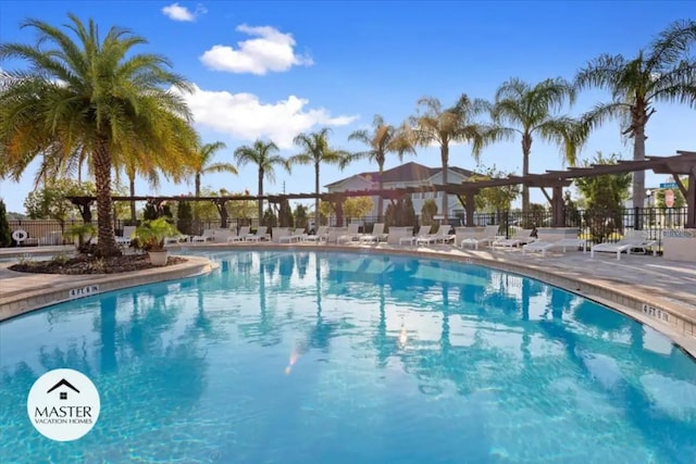 view of swimming pool with a patio area