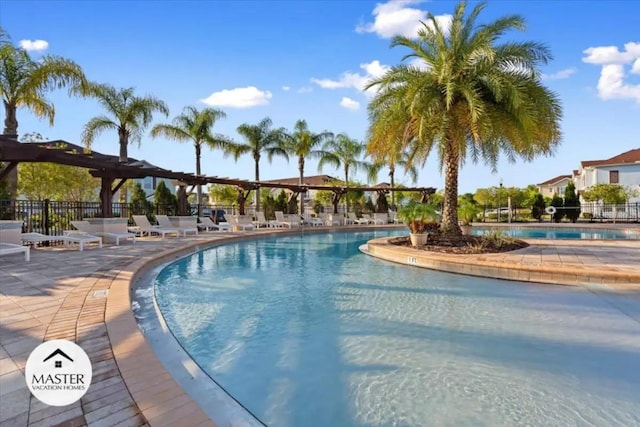 view of swimming pool with a patio area