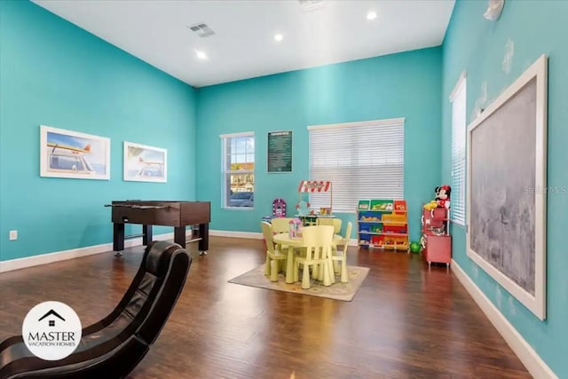 recreation room featuring dark hardwood / wood-style floors