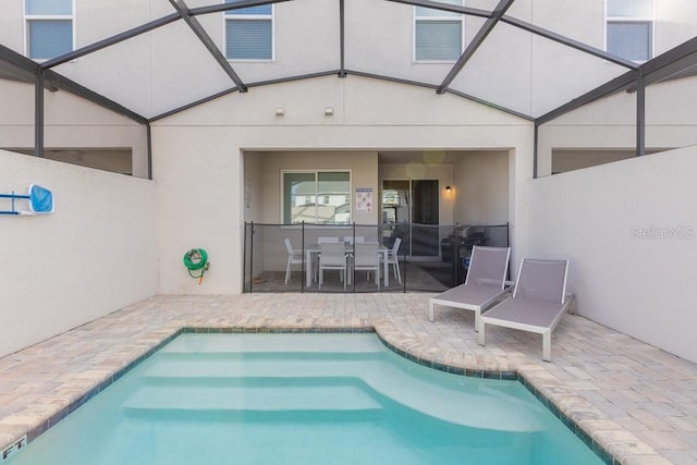 view of pool featuring a patio area