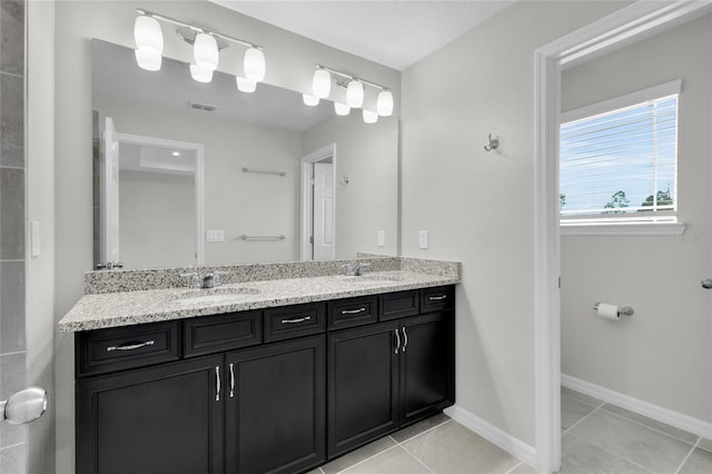 bathroom featuring vanity and tile patterned floors