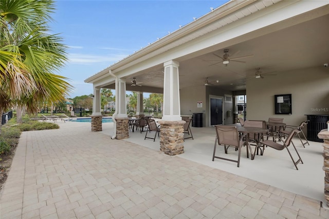 view of patio / terrace featuring ceiling fan