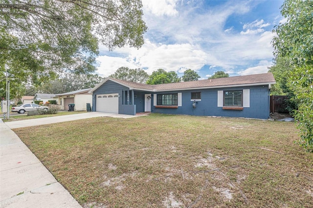 ranch-style house with a front lawn, fence, concrete driveway, concrete block siding, and a garage