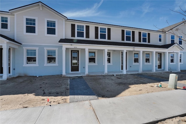 multi unit property featuring covered porch