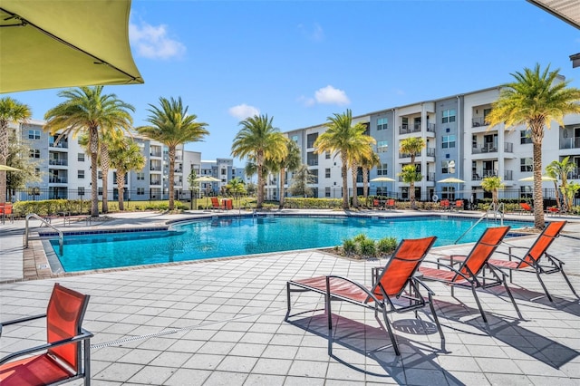 view of pool featuring a patio area