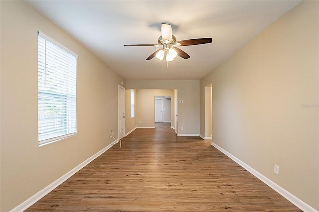 hallway with light hardwood / wood-style flooring