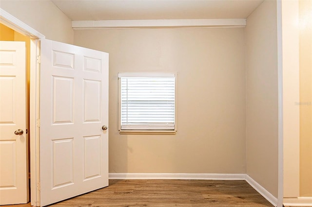 unfurnished bedroom featuring wood-type flooring