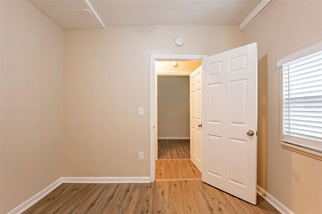 unfurnished room featuring light hardwood / wood-style floors