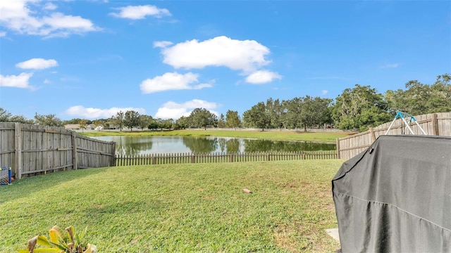 view of yard with a water view