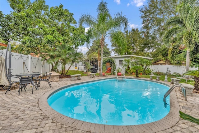 view of swimming pool featuring a patio