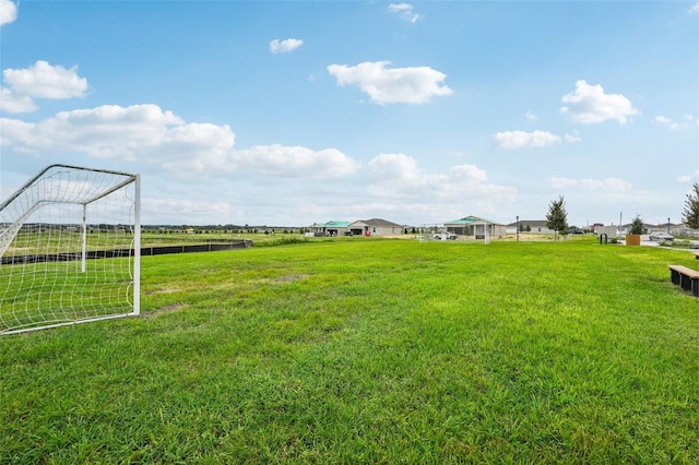 view of yard with a rural view