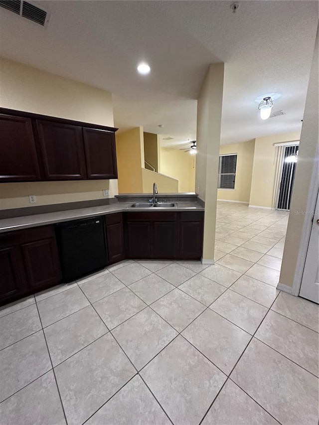 6430 S Goldenrod Rd Unit 15B, Orlando, FL 32822 - kitchen with dishwasher, a sink, light tile patterned flooring, dark brown cabinets, and a ceiling fan