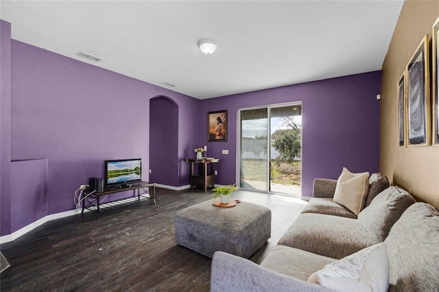 living room with dark wood-type flooring