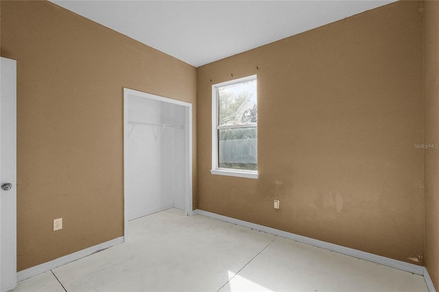 unfurnished bedroom featuring a closet