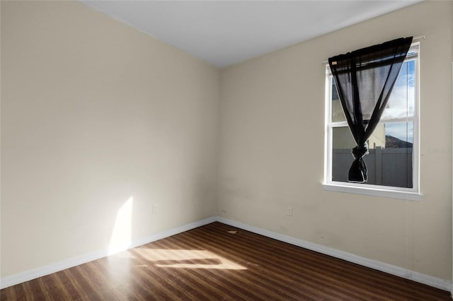 unfurnished room featuring hardwood / wood-style floors