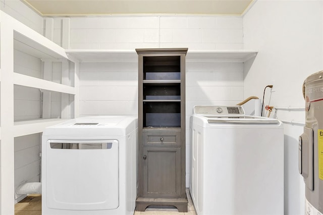 laundry room with washer and dryer