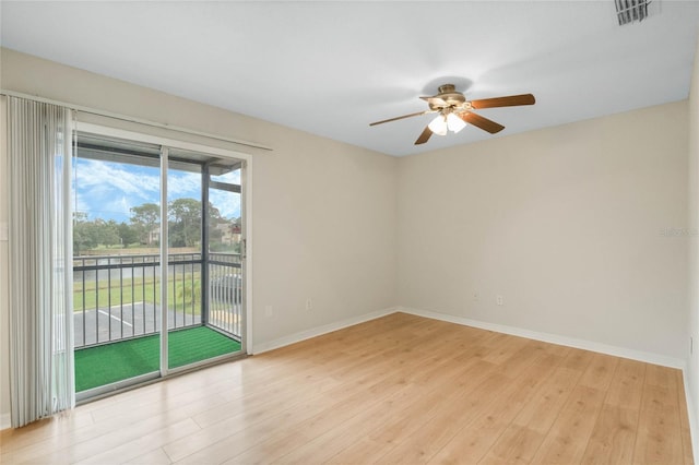 unfurnished room with light hardwood / wood-style floors and ceiling fan