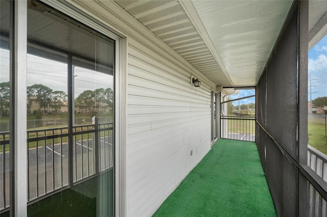 unfurnished sunroom with a healthy amount of sunlight