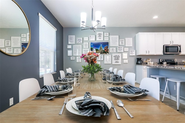 dining room featuring a notable chandelier