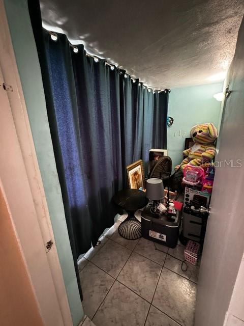 bathroom featuring tile patterned flooring