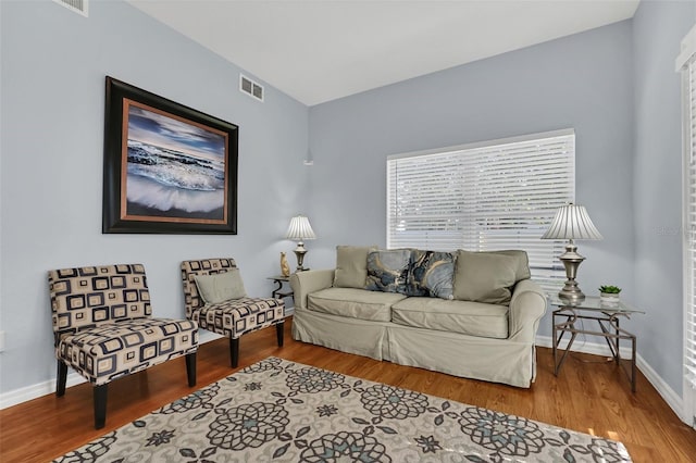 living room with hardwood / wood-style flooring