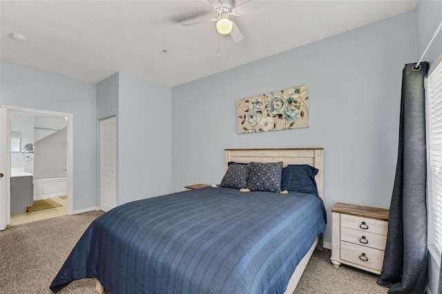 bedroom with carpet, a closet, ensuite bathroom, and ceiling fan