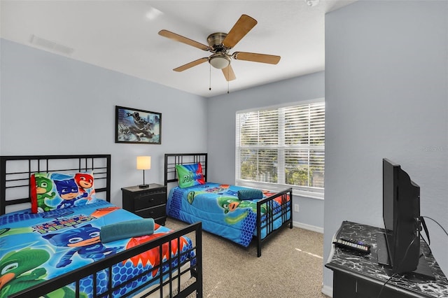 bedroom featuring ceiling fan and carpet flooring