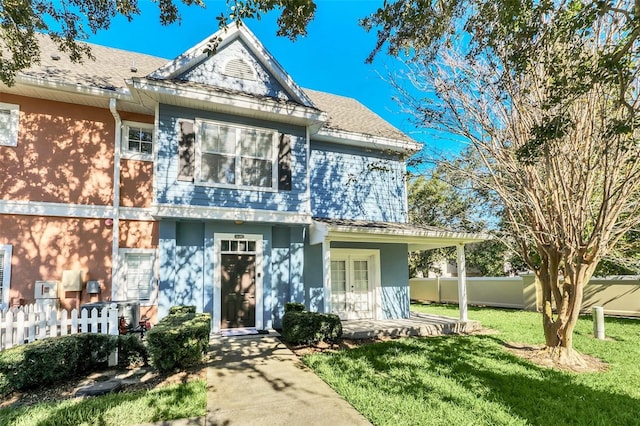 view of front of home featuring a porch and a front yard