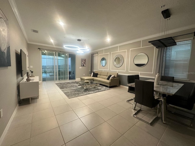 tiled living room featuring a textured ceiling and ornamental molding