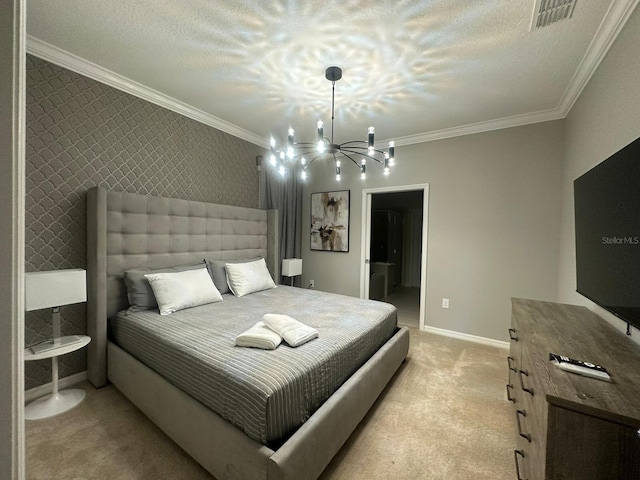 carpeted bedroom with ensuite bathroom, ornamental molding, a textured ceiling, and a chandelier