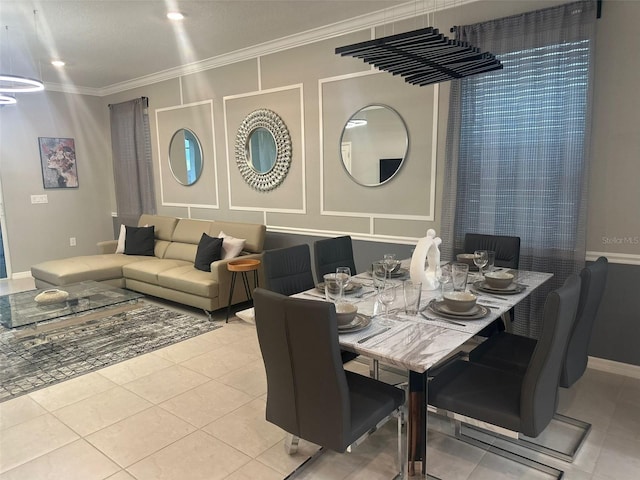 tiled dining room featuring crown molding