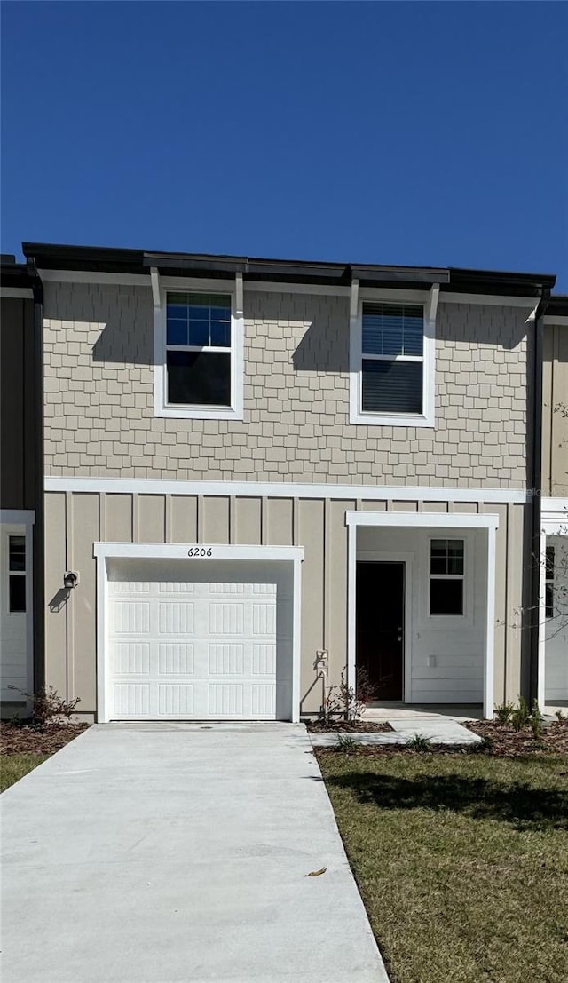 view of front of property featuring a garage