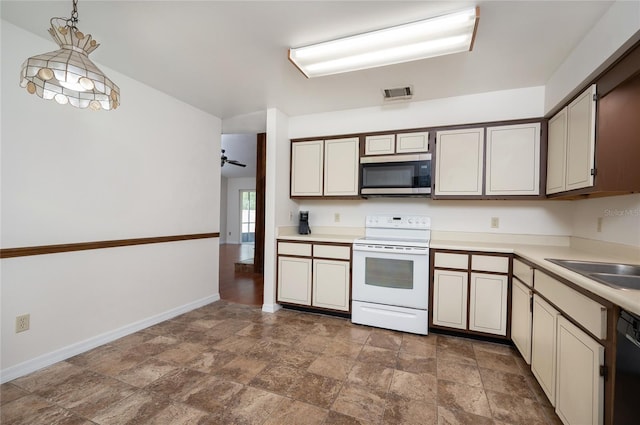 kitchen with white electric range oven, ceiling fan, sink, decorative light fixtures, and black dishwasher