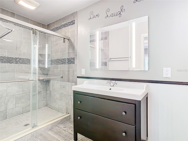 bathroom featuring vanity and walk in shower