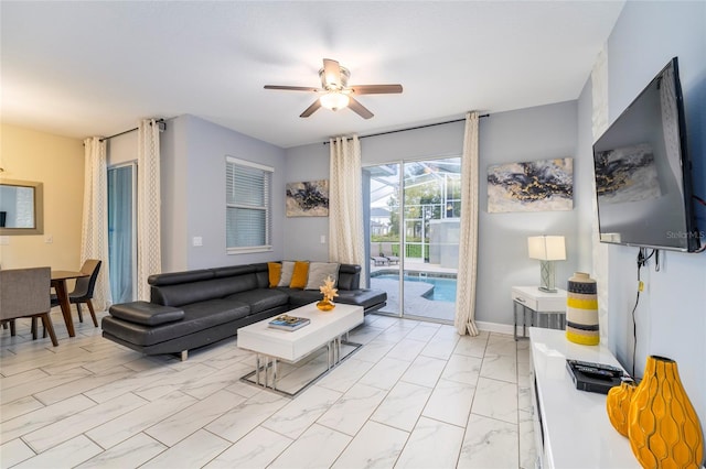 living room featuring ceiling fan