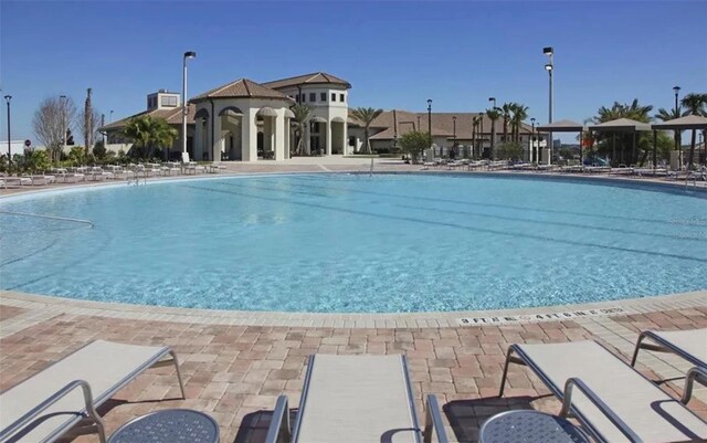 view of swimming pool featuring a gazebo