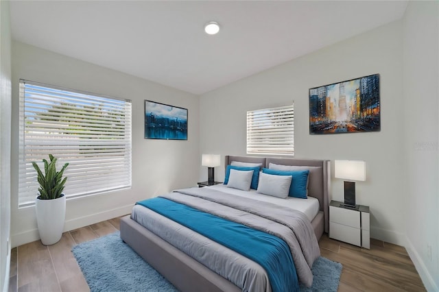 bedroom with light hardwood / wood-style floors