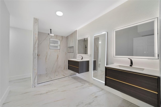 bathroom featuring vanity and a tile shower