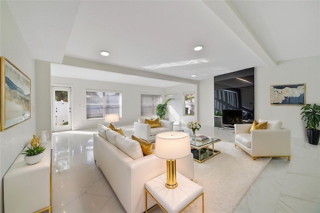 living room with beam ceiling