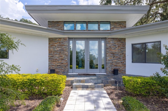 entrance to property featuring french doors