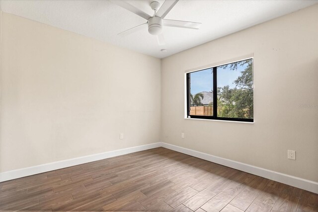 12550 Lakeshore Dr, Clermont, FL 34711 - empty room featuring wood finished floors and ceiling fan