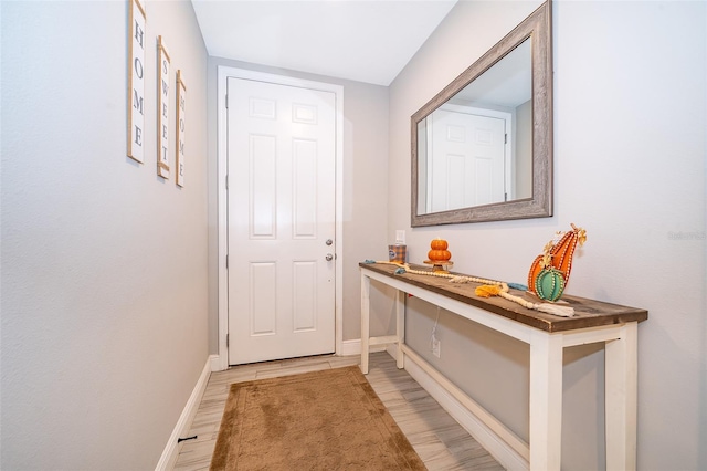 doorway featuring hardwood / wood-style flooring