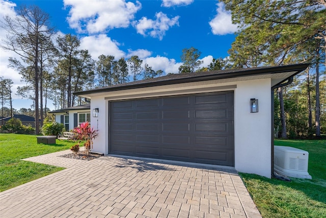 garage with a yard