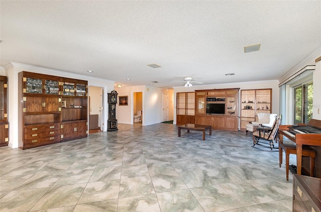 living room featuring crown molding, ceiling fan, and a textured ceiling