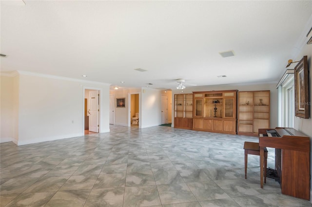 unfurnished living room with a ceiling fan, ornamental molding, and baseboards
