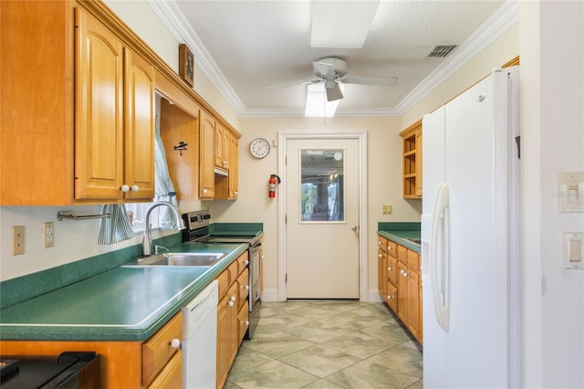 kitchen with white appliances, crown molding, a sink, and a ceiling fan