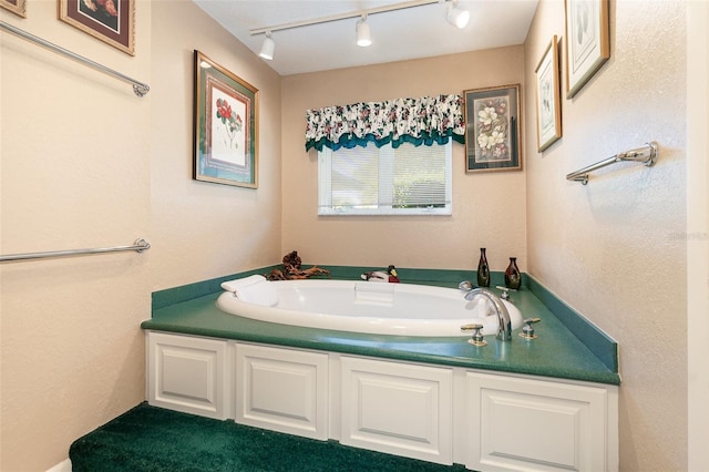 bathroom featuring a bath